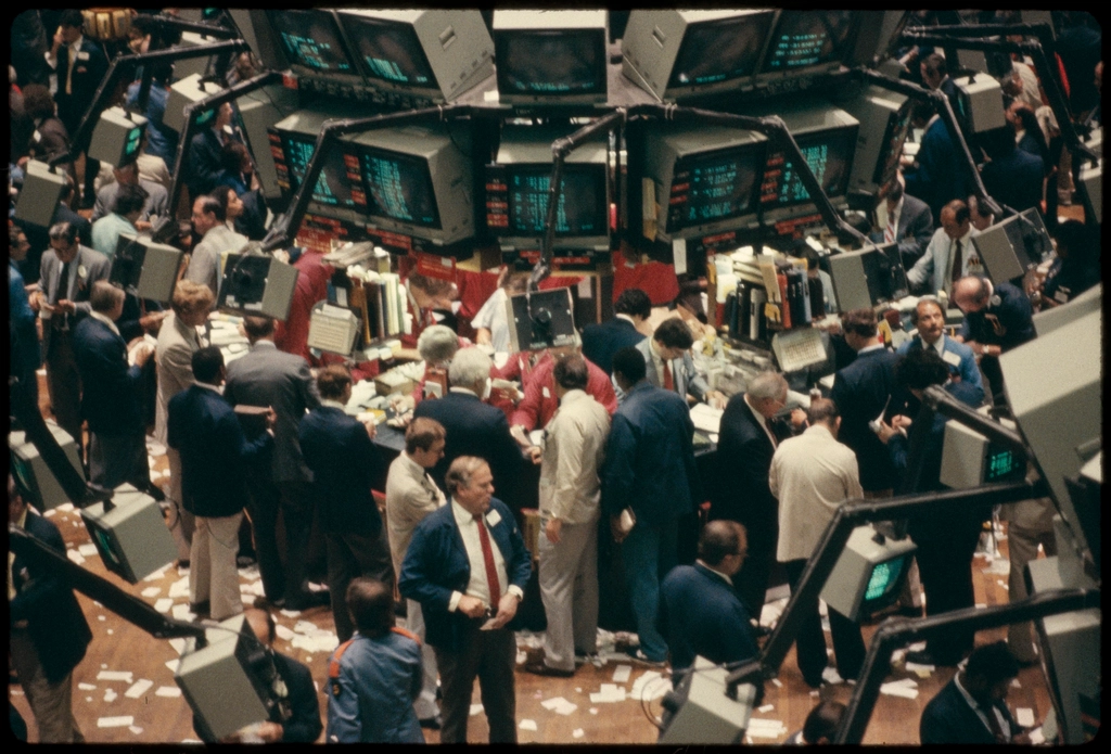 Trading floor screens representing broker-dealer capital raising activity